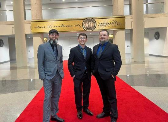 L to R: Michael Tucker, WOLF Radio operations manager; Jason Barker, WOLF Sports Wolf-In-Training Program coordinator; and Shawn Isaacs, WOLF general manager